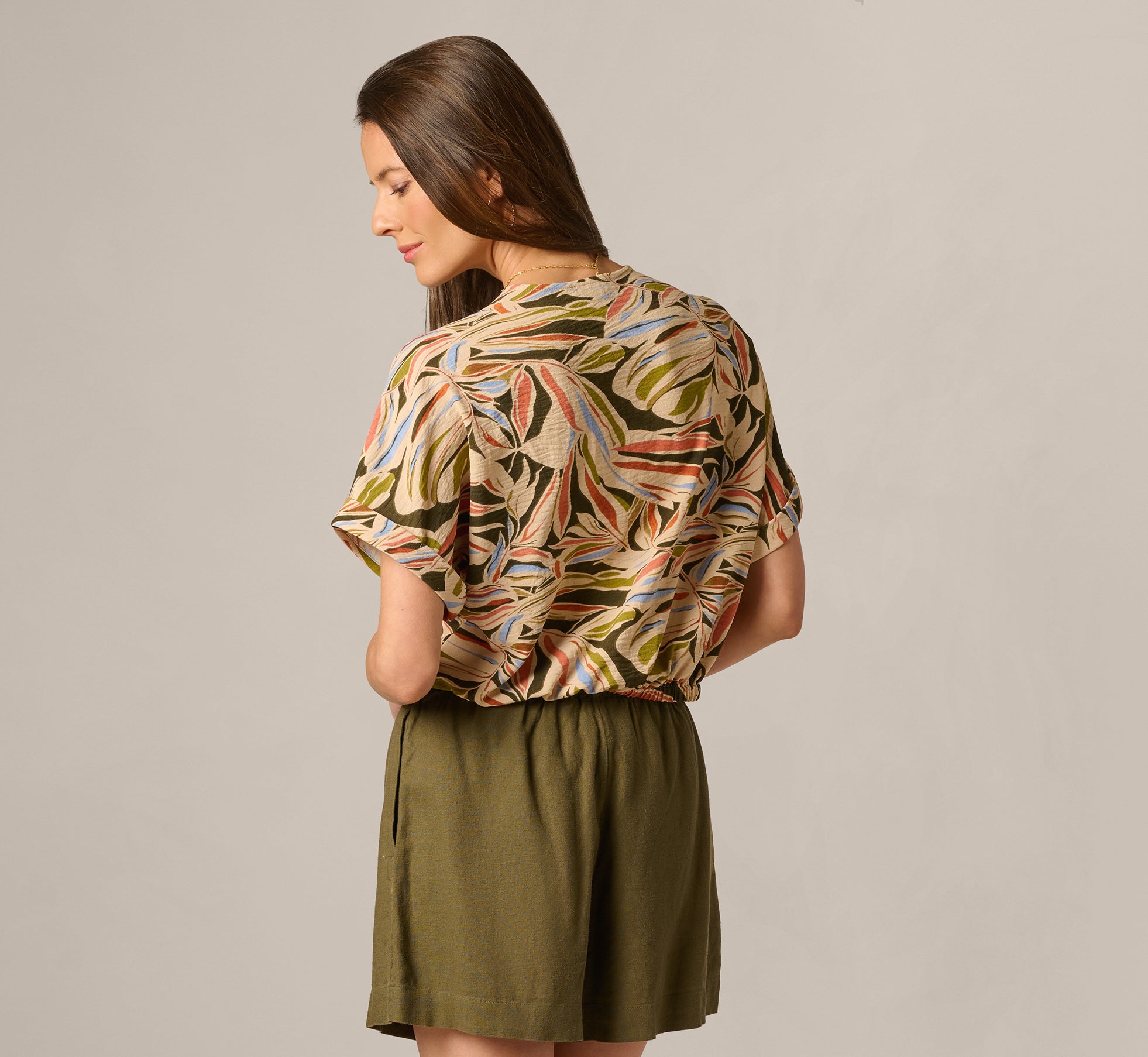 Short Sleeve Open Twist Front Top In Watercolor Leaf